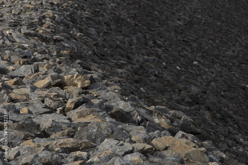 The rock is lined with dams