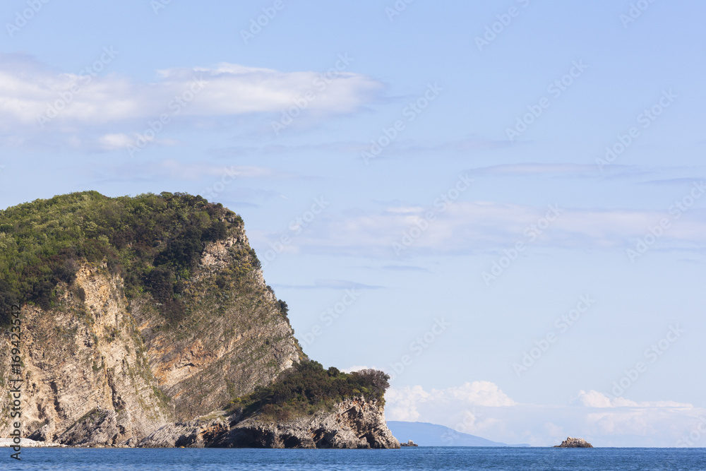 Europe, Montenegro, the Sveti Nikola island located opposite to the beach of Budva Europe, Montenegro, the Sveti Nikola island located opposite to the beach of Budva