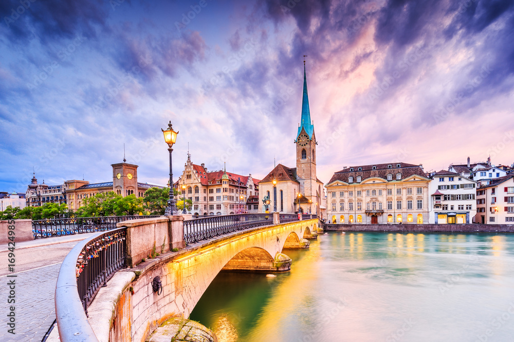 Zurich, Switzerland. View of the historic city center with famous Fraumunster Church, on the Limmat river.