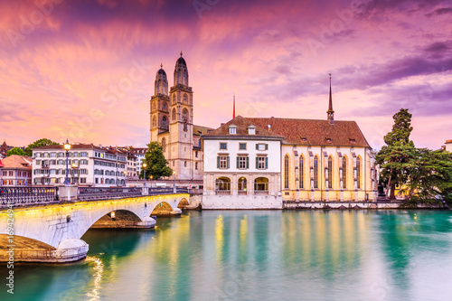 Zurich, Switzerland. View of the historic city center with famous Grossmunster Church, on the Limmat river.