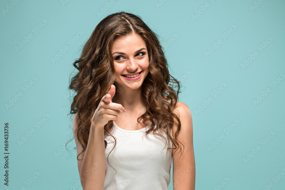 The young woman's portrait with happy emotions The young woman's portrait with happy emotions