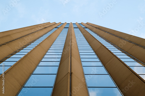 High rise building reflecting blue sky © David Johnson