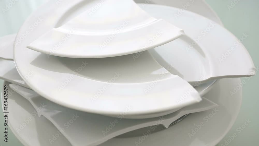 pile of broken white plates on rotating plate
pile of broken white plates on rotating plate