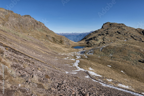 Italy, Trentino Alto Adige, Non Valley, dolomite lake on Luco Mount. photo