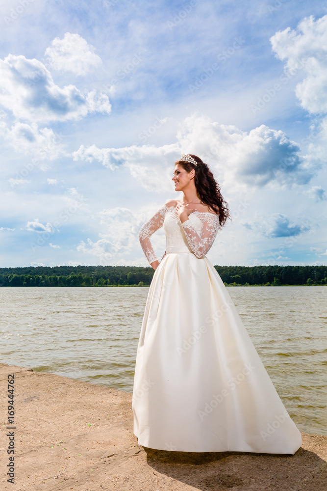 Portrait of very beautiful bride and cloudy sky Portrait of very beautiful bride and cloudy sky