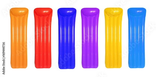 Multicolored inflatable floating pool raft mattress set isolated on white.