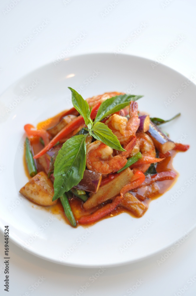 Shrimp Red Curry. Traditional red curry paste and sweet coconut milk with bamboo shoot, bell pepper, eggplant and sweet basil leaves. Shrimp Red Curry. Traditional red curry paste and sweet coconut milk with bamboo shoot, bell pepper, eggplant and sweet basil leaves.