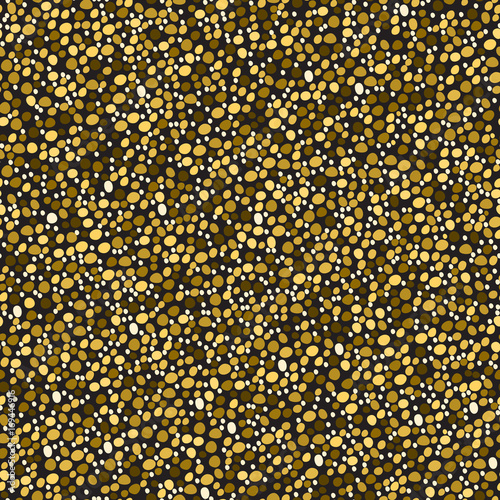 Abstract seamless background with golden dots . Vector