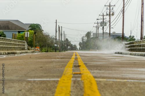 Water coming over the road in Kemah Texas during Hurricane Harvey photo