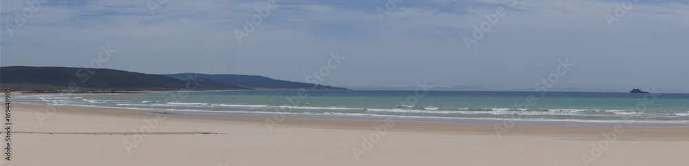 Barbate beach in May panoramic view. Barbate is a coastal town located in the province of Cádiz, It is situated at the mouth of the River Barbate, between Zahara de los Atunes and Los Caños de Meca. Barbate beach in May panoramic view. Barbate is a coastal town located in the province of Cádiz, It is situated at the mouth of the River Barbate, between Zahara de los Atunes and Los Caños de Meca.