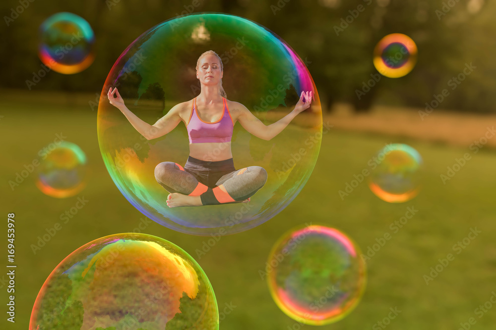 A yoga woman is hovering in a soap bubble(mixed media) Stock Photo