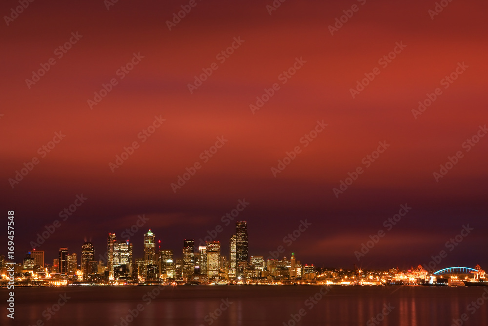 Seattle skyline under fiery dawn sky