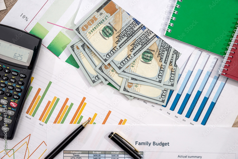 finance concept - money, business graph, pen, notepad, calculator finance concept - money, business graph, pen, notepad, calculator