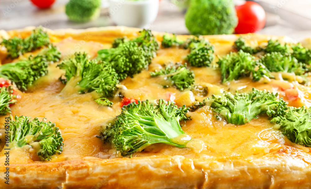 Traditional quiche with broccoli and cheese, close up Traditional quiche with broccoli and cheese, close up