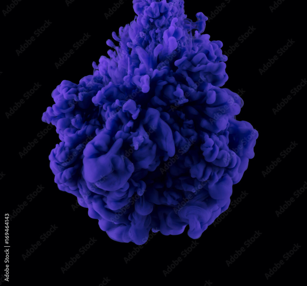 The cloud of purple paint in the dark water The cloud of purple paint in the dark water