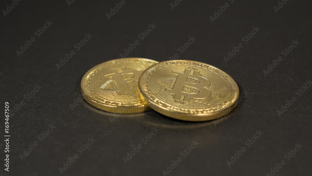 Crypto currency Gold Bitcoins - BTC - Bit Coin. Macro shots crypto currency Bitcoin coins. Crypto currency Gold Bitcoins - BTC - Bit Coin. Macro shots crypto currency Bitcoin coins.