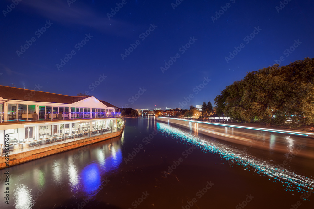 The River Thames in Reading, UK at night on a warm summer's evening. 
