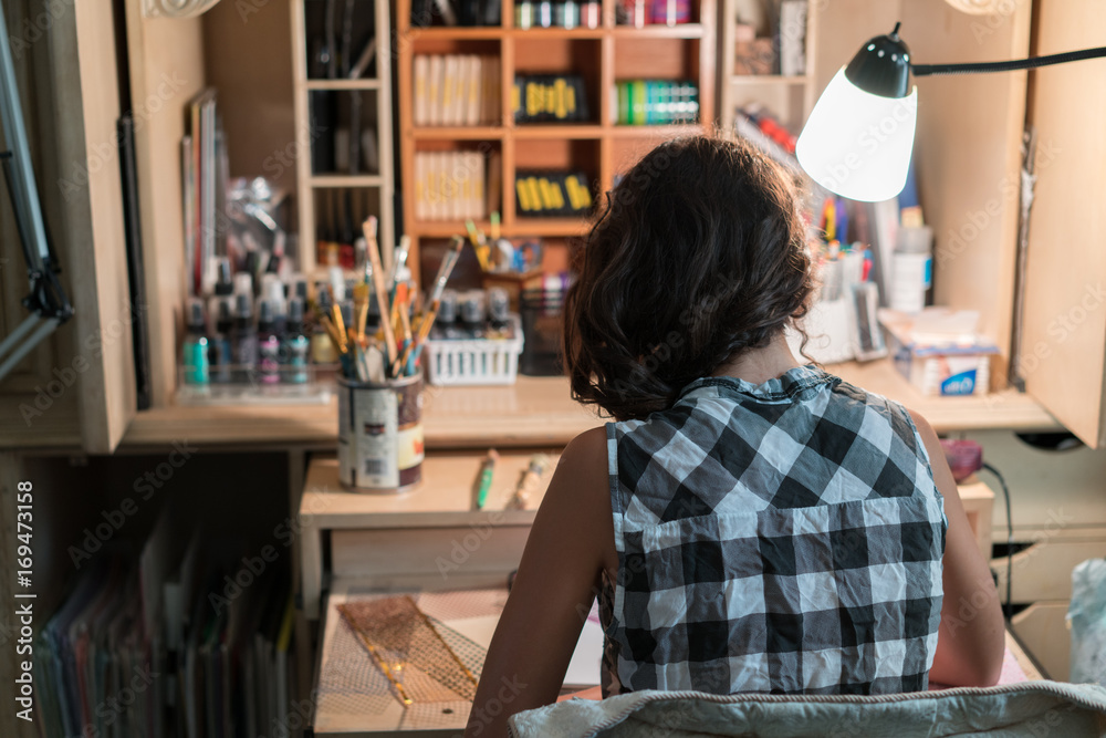 Teenager studying at her desk