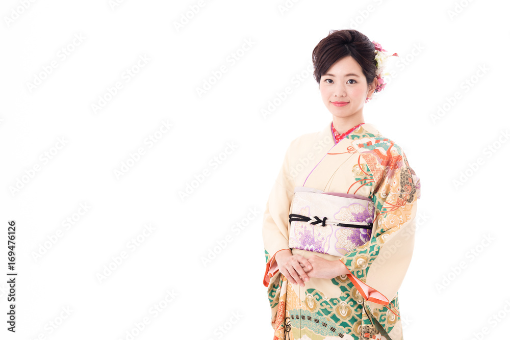 portrait of young asian woman wearing traditional kimono isolated on white background