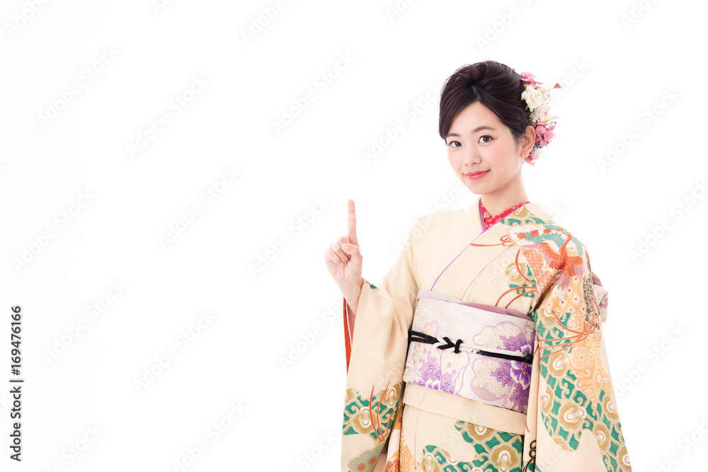 portrait of young asian woman wearing traditional kimono isolated on white background