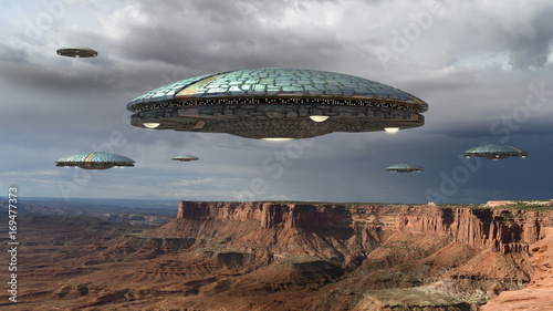 Photography Alien spaceship fleet above the Grand Canyon, in Canyonlands, Utah, USA, for futuristic, fantasy and interstellar travel or war game backgrounds