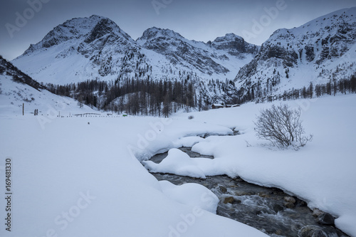 View of the winter landscape outside the village of Sertig Dorfli. Sertigtal, Graubuenden(Canton Grigioni),Prattigau(Prattigovia)/Davos, Switzerland, Europe photo
