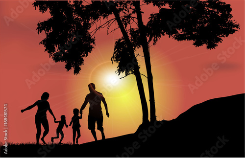 Family walk at sunset