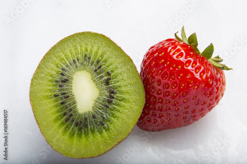 Closeup of strawberries and sliced kiwi fruits