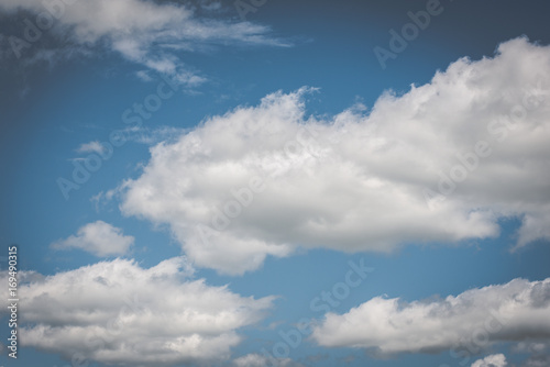 White Clouds and Blue Sky Background © clubhousearts