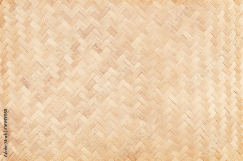 Close up of old woven bamboo in natural patterns, handmade weave bamboo texture background.