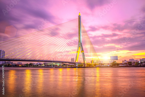 Thailand RAMA 8 suspension bridge sling landmark cross the river with twilight sunset sky landscape