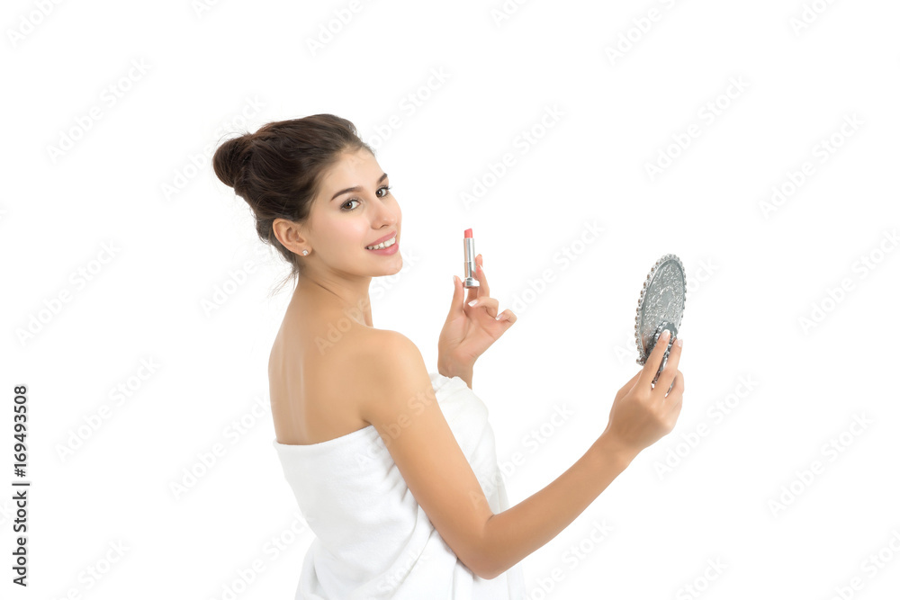 Beautiful woman with hand holding makeup element isolated on white. Beautiful woman with hand holding makeup element isolated on white.