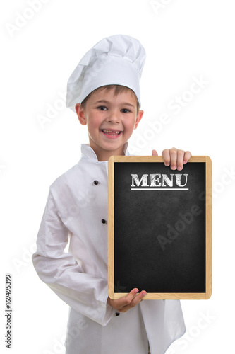 Small funny chef in white uniform holding a menu board, on white background. photo