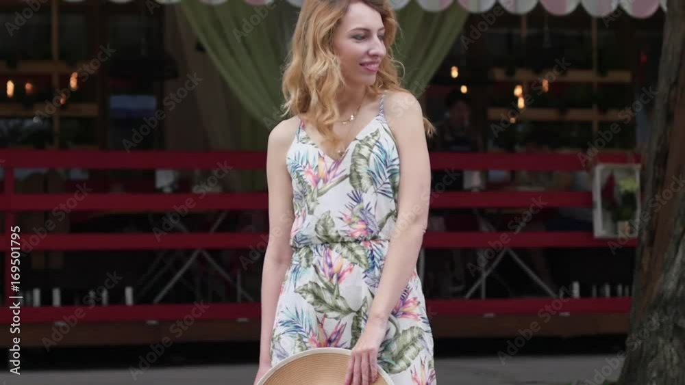 beautiful young blond woman walking around the city.slow motion beautiful young blond woman walking around the city.slow motion