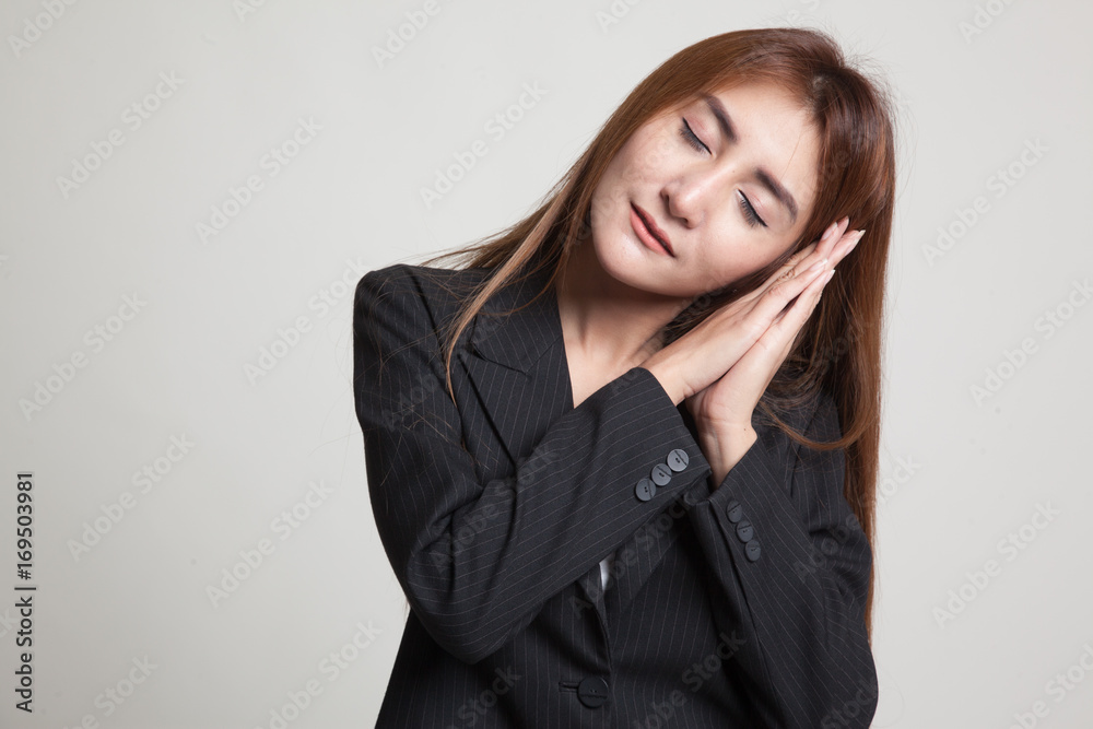 Beautiful young Asian woman with sleeping gesture. Beautiful young Asian woman with sleeping gesture.