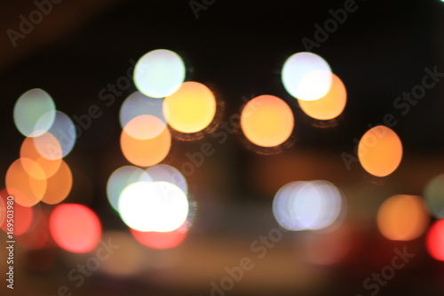 Bokeh Abstract background from car in street in night time. Elegant abstract background with bokeh defocused lights.