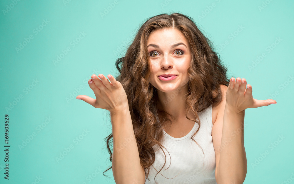 Fototapeta premium Portrait of young woman with shocked facial expression