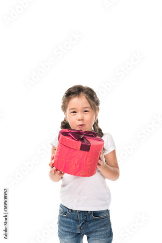 child with gift boxes