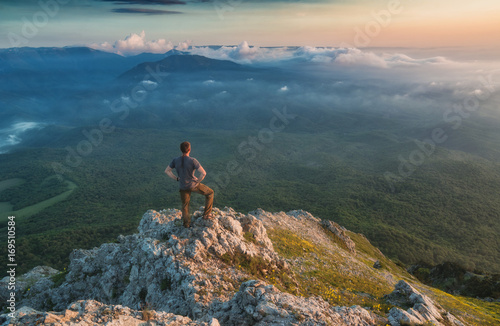 Man standing on a rocky mountain top