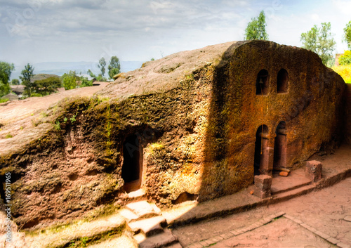 The bell tower of Biete Mariam rock-hewn church at Lalibela, Ethiopia photo