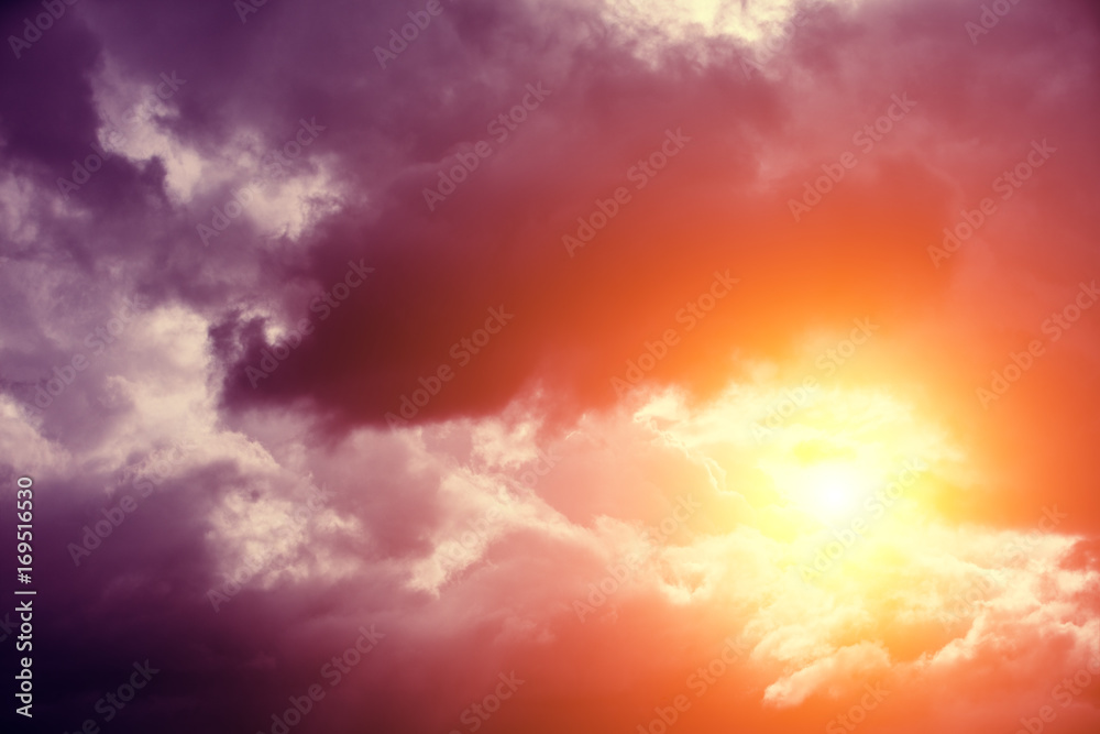 Cloudy sky with the sun. The sun is peeping out of the clouds Cloudy sky with the sun. The sun is peeping out of the clouds
