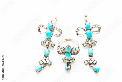 Earrings and a ring with turquoise in the form of a bow