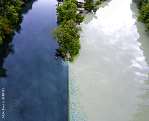 Pointe de la Jonction. the 2 rivers of Le Arve and Le Rhone meeting in Geneva, Switzerland.