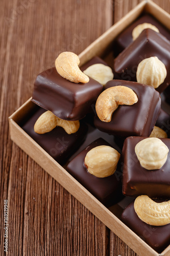Handmade chocolate bonbons with hazelnut
