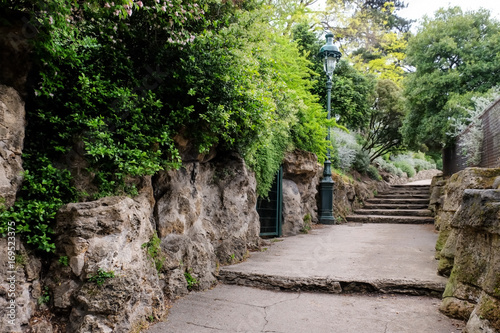 Beautiful spring landscape with green trees and stairs