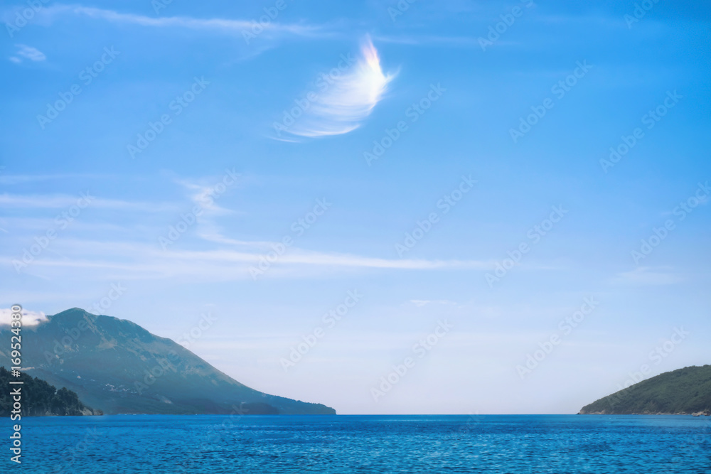 Picturesque seascape of misty islands on sunny day