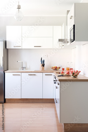 New modern white kitchen interior background © andreaobzerova