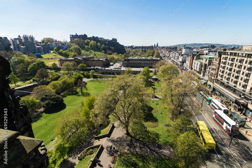 A view looking west along Princes Street from the Scott Monument towards Edinburgh Castle and the National Gallery.