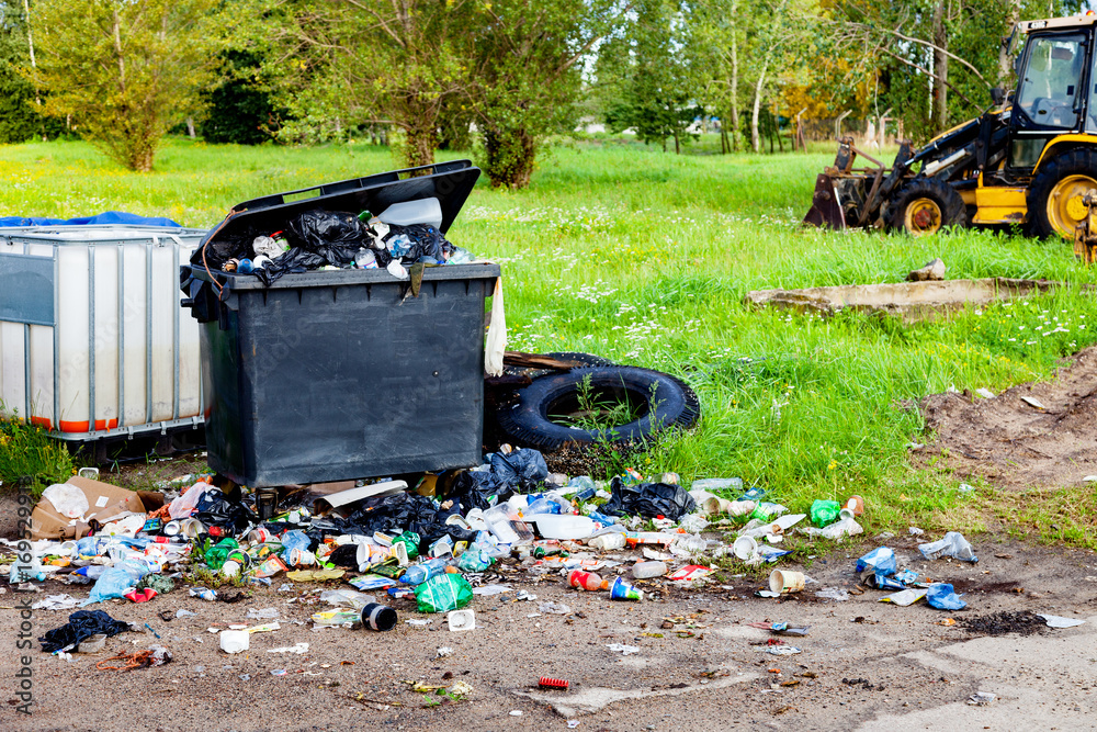 Garbage waste in park full of all sort of trash. Garbage waste in park full of all sort of trash.