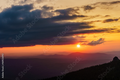 Spectacular sunset over mountain range in Sheregesh, Siberia